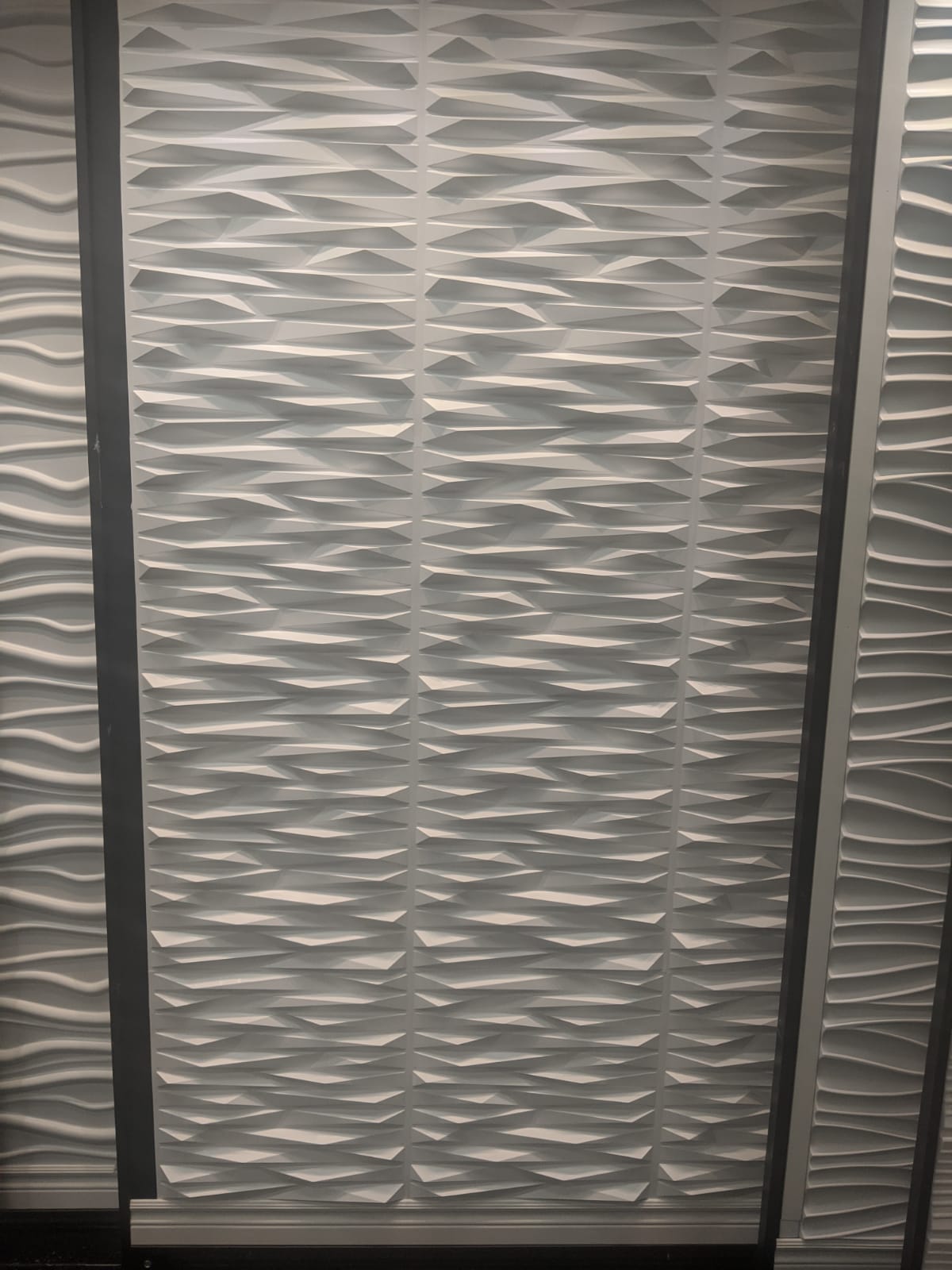 Feature wall and trim work by VSS Construction Inc.